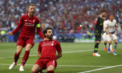 Mohamed Salah of Liverpool celebrates with Jordan Henderson